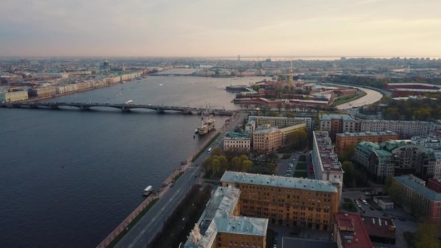 Aerial view in the central part of the city of Russia over the cruiser Aurora on the embankment of the Neva River in St. Petersburg