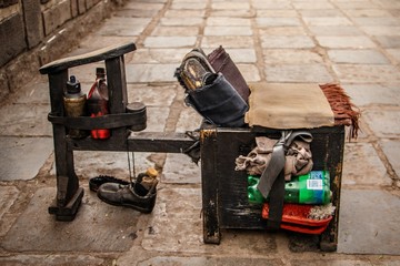 Shoes cleaning set on the street of Cuzco, Peru