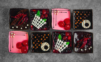 Different pastries tasty assortment. Dessert tray assorted top view background. Cakes, bright, colorful pastry sweets with fresh berries. French Bakery pattern. Flat lay. Blank space. © fserega