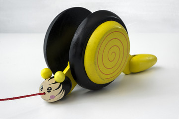 Pull along yellow wooden snail