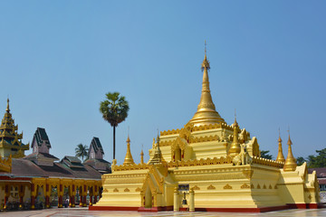 Fototapeta na wymiar Beautiful golden pagoda in Shwe Sar Yan Buddhist complex in Thaton, Myanmar (Burma).