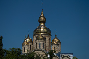 Obraz premium Orthodox temple against the blue sky. A park. Cherkassy, Ukraine. 2017