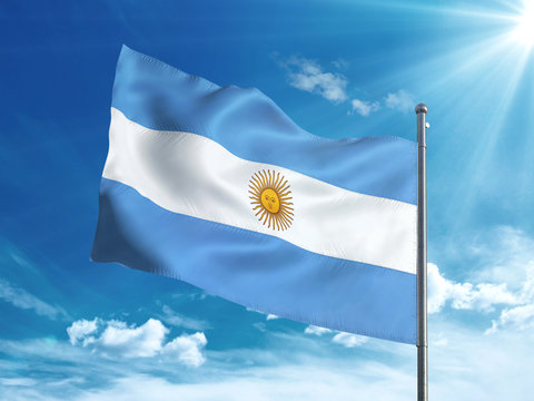 Argentina Flag Waving In The Blue Sky