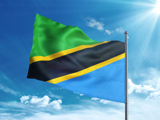 Tanzania flag waving in the blue sky