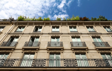 The facade of Parisian building, France.