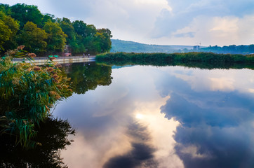 Obraz premium The lake at sunset before a storm. Natural landscape.