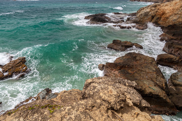 Fototapeta na wymiar Surf and Rocks from St Bart's in the Caribbean