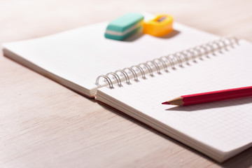 Pencil on notebook on desk