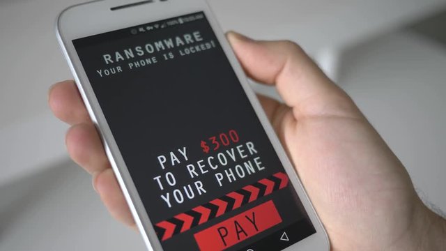 Smartphone being infected by a ransomware virus that is asking for money to retrieve the encrypted files.