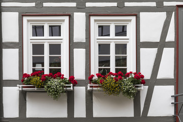 Windows of a historic half-timber house in Germany