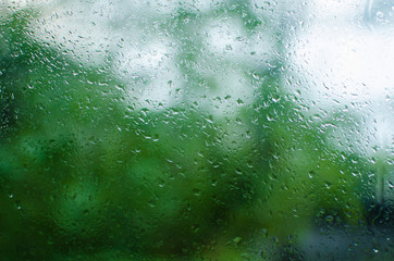 rain on glass/rain on window/drop of water on glass