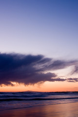 Clouds during golden hour over pacific ocean