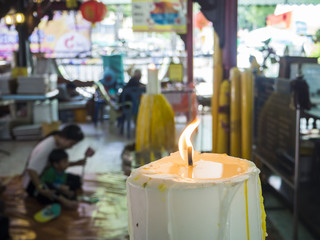 Light of candle, burning candle in temple