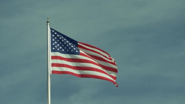 US National flag on blue sky background