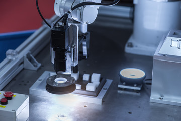 Robotic machine vision system in phone factory