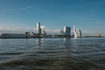 Rotterdam city cityscape skyline with Erasmus bridge and river. South Holland, Netherlands.