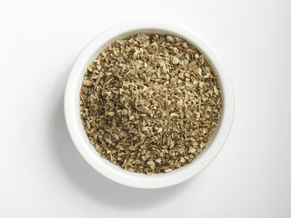 Bowl of dried oregano leaves