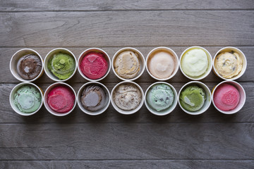 Top view Ice cream flavors in cup on blackground