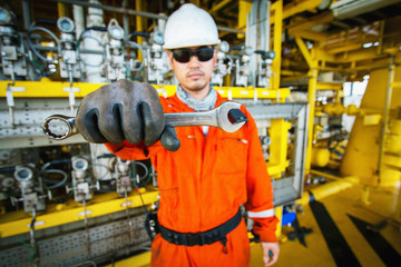Technician, hand of technician holding wrench with right hand side