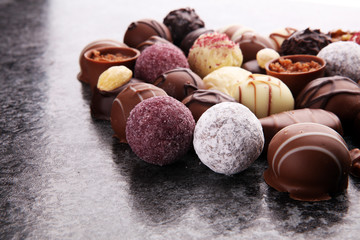 a lot of variety chocolate pralines, belgian confectionery gourmet chocolate
