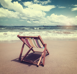 Deck chair at the tropical beach