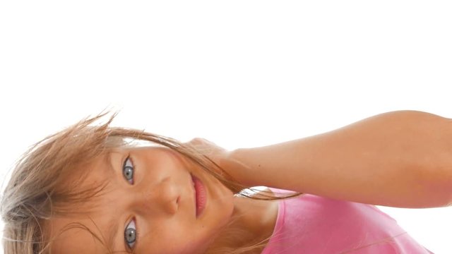 Blue-eyed girl.&nbsp;Beautiful girl with blue eyes looks at the camera. Happy child. Close-up.