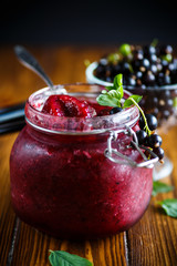 Berry ripe black currant with jam
