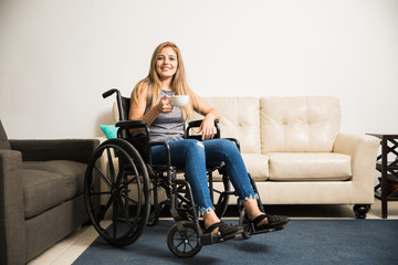 Fototapeta na wymiar Disabled woman relaxing at home