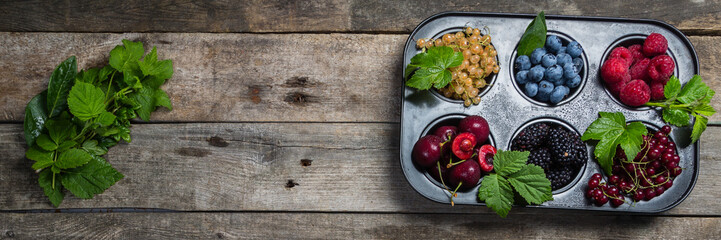 Selection of berries in cupcake form - healthy dessert concept