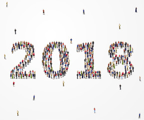 Large and diverse group of people seen from an aerial perspective, gathered together in the shape of number 2018.