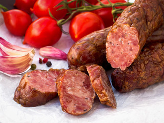 Smoked dried sausage with tomatoes