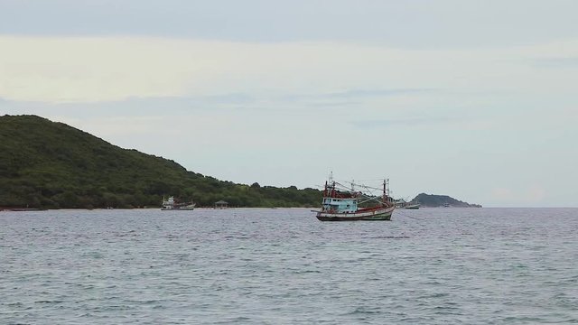 The Fishing boat out of harbor	