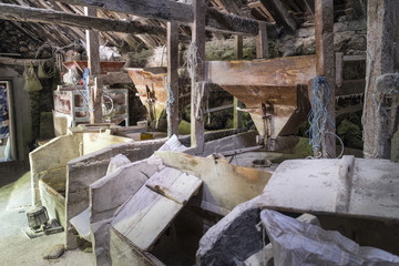 Fototapeta na wymiar Interior of an old grain mill on the Grab River near the town Trilj in Croatia