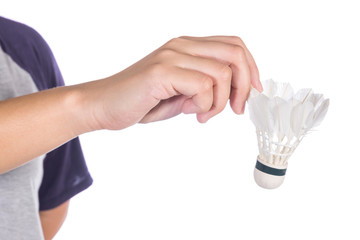 Hand holding Badminton shuttlecock isolated on white background