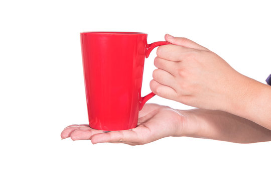 Hand Holding Red Coffee Cup Isolated On White Background.