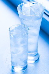 Drink. Water glass and ice