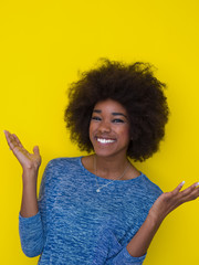 black woman isolated on a Yellow background