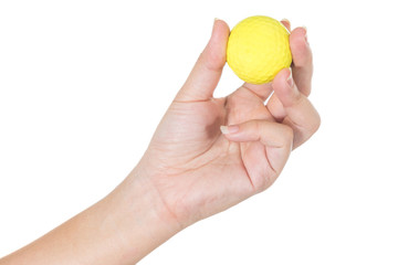 Golf ball in hand isolated on white background