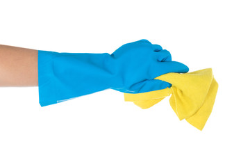 Female hand in blue glove holding yellow rag isolated on white background