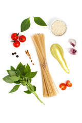 Ingredients for cooking spaghetti with Pesto sauce and tomatoes on a white background..