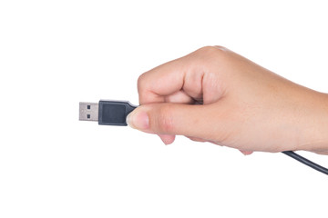 Hand holding USB cable isolated on white background