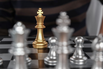 One pawn staying against full set of chess pieces.