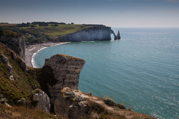 The Porte d'Aval, L'Aiguille and pebbled beach at Etretat, a commune in the Seine-Maritime department in the Normandy region of north western France