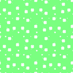 Vector seamless pattern with white flowers on green.