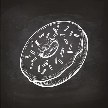 Donut sketch on chalkboard.