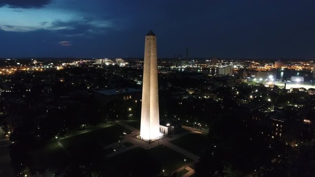 Aerial orbit Bunker Hill Monument at night 4k