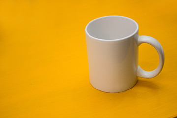 Mug on the yellow table