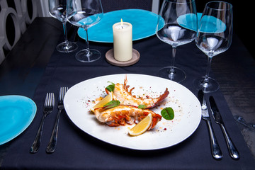 Lobster tail in maple-truffle sauce with lemon and basil