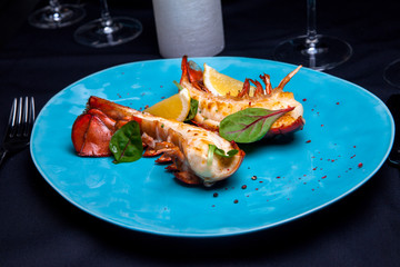 Lobster tail in maple-truffle sauce with lemon and basil