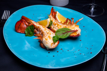 Lobster tail in maple-truffle sauce with lemon and basil